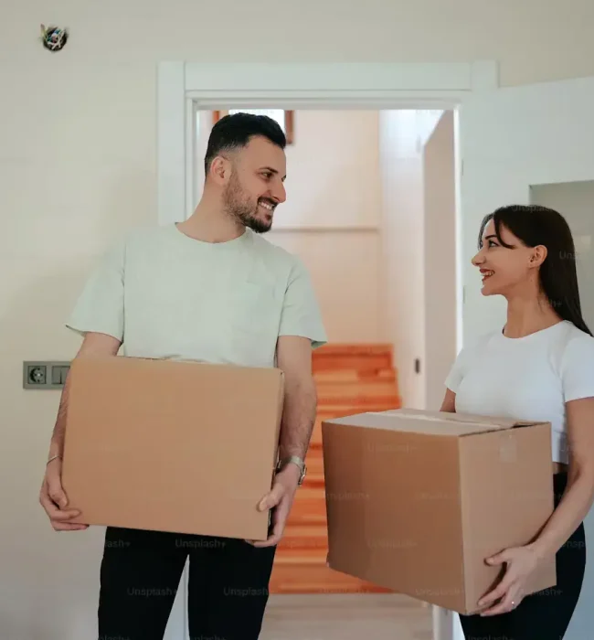 men and women moving in cleaning